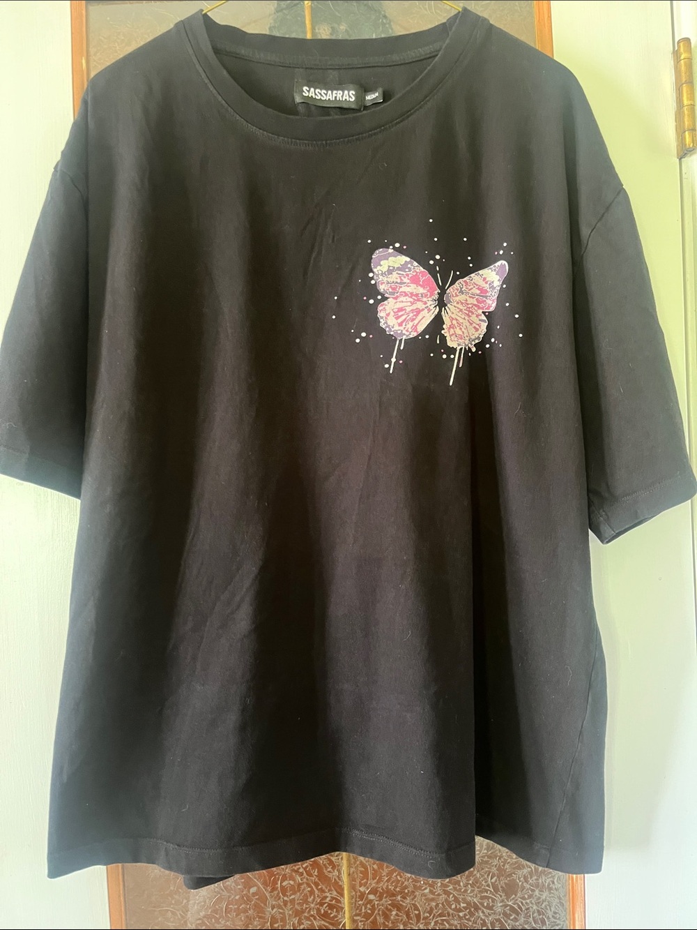 Sassafras Black Tee with Pink Butterfly Graphic